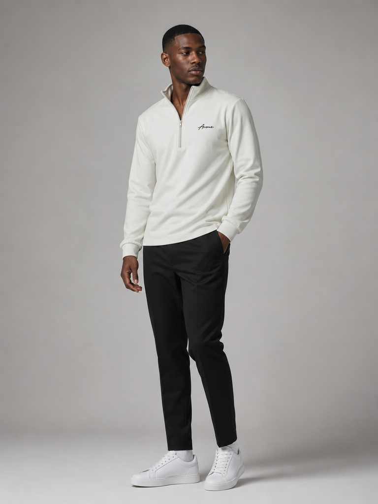 Model wearing the ARME cream quarter zip, front view