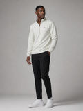 Model wearing the ARME cream quarter zip, front view