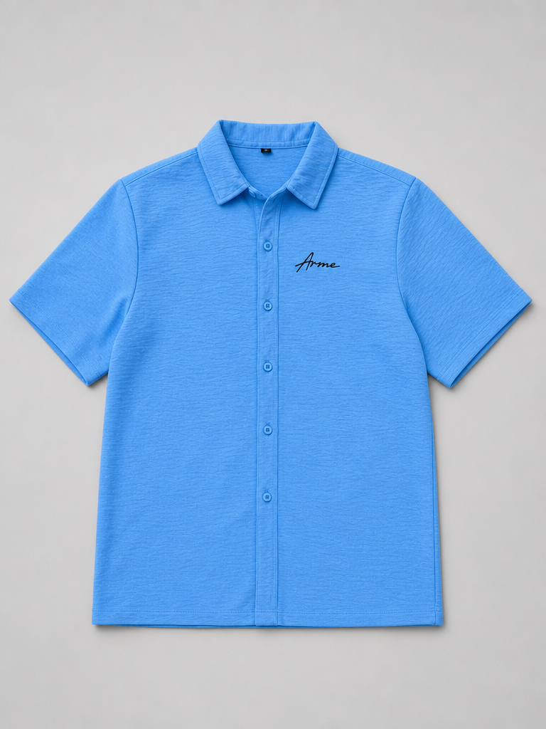 Flat lay front view of the ARME Cuban button-up shirt in baby blue