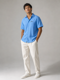 Model wearing the ARME Cuban button-up shirt in baby blue, front view