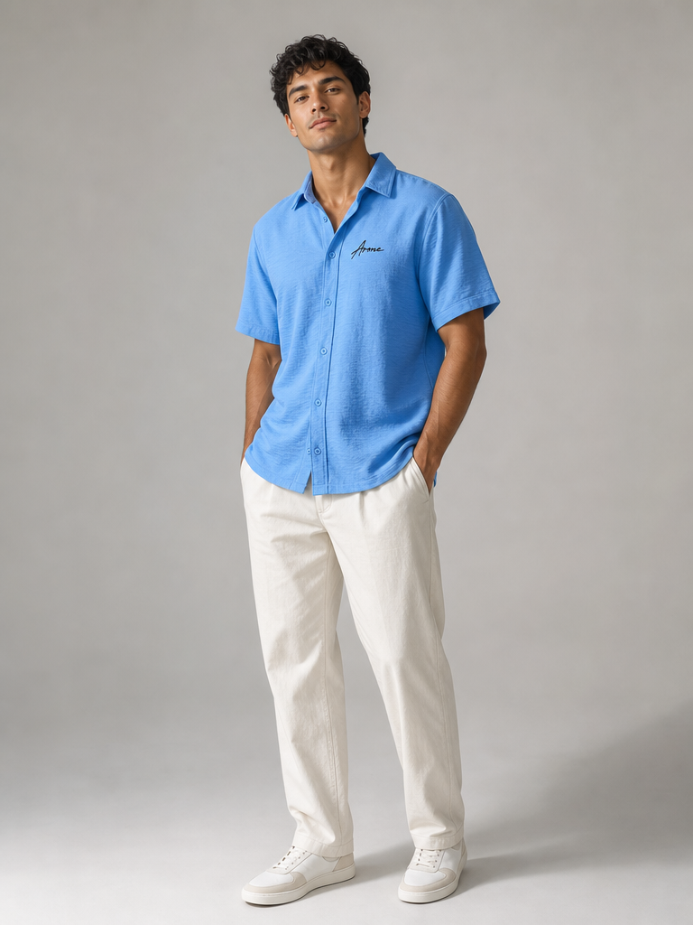 Model wearing the ARME Cuban button-up shirt in baby blue, front view