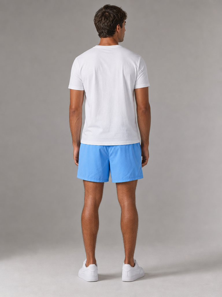 Model wearing the ARME Summer Short in baby blue, back view